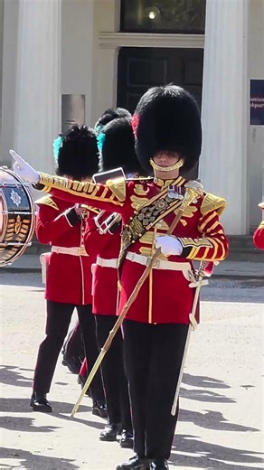 Coldstream Guards Drum Major leads the Band of the Irish Guards