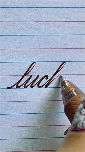 “lucky” (cursive writing)