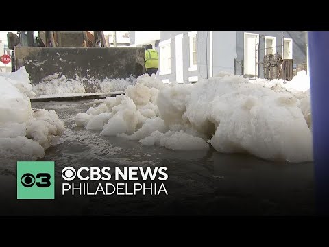Apparent water main break fills Philadelphia street with water, ice amid freezing temps