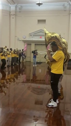 Warren Easton High School marching band surprised with $10,000