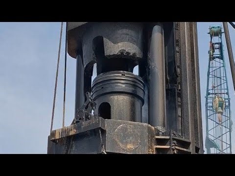 Planting D600 concrete poles using a Diesel Hammer DD65 