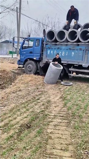 Worker Catches Heavy Concrete Pipes BY HAND Mid-Fall | All to Keep Them Vertical (No Breakage!)