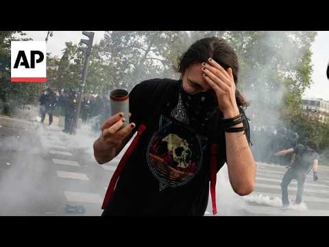 Riot police fire tear gas as thousands rally in Paris over school funding
