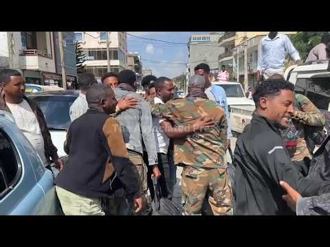 Ethiopian government-allied fighters do victory laps in Mekelle after reclaiming town from rebels