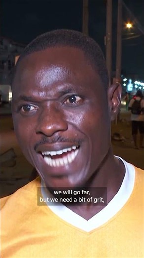 Ivory Coast fans celebrate as the Elephants reach knockouts