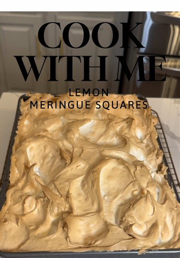 In 2026 I am cooking through Ina Garten’s Go To Dinners Cookbook and today I made the Lemon Meringue Squares!!! I was intimidated by this recipe but I learned lots! This was the first time I had made a custard or meringue but I did it!! I would line the baking sheet with parchment paper next time :) #inagarten #gotodinners #cookingthroughacookbook #lemonsquares #lemommeringue