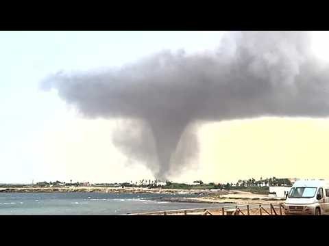 Tornadoes sweep across Sicily, leaving flipped cars and damaged buildings