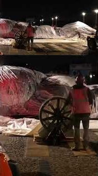 French Artist JR Inflates Giant ‘Cave’ Installation Over Paris’ Oldest Bridge, Visuals Go Viral