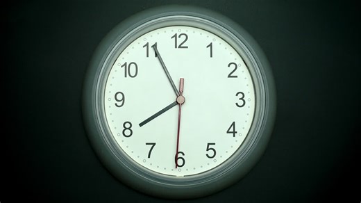 Clock isolated on black background, Showtime 07.55 am or pm. | Premium Stock Video Footage