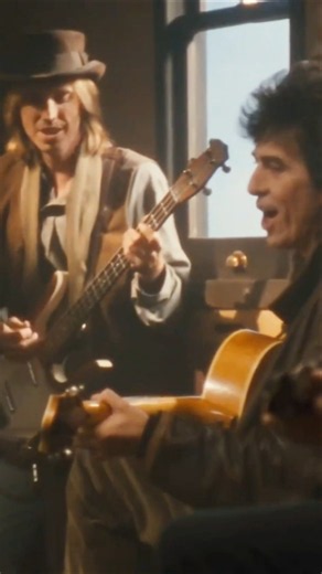 The Traveling Wilburys perform their classic song End Of The Line pt3