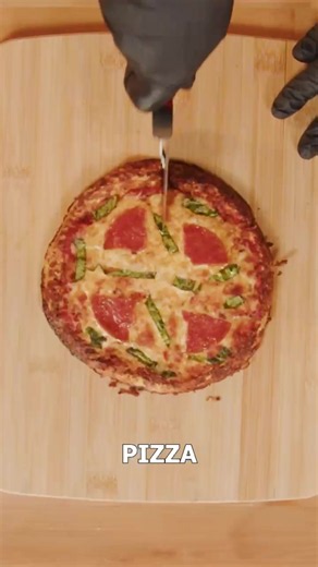 Make this delicious, healthy keto pizza at home. It's the perfect way to satisfy that pizza craving! Tag someone you'd love to cook it with. Dr. Eric Berg, DC, not MD; information only #ketofoods #healthyfood #pizza #drericberg