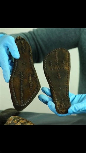 Thousands of Roman shoes have survived in the waterlogged ground at Vindolanda, preserved because the low-oxygen conditions slowed the decay of the leather. The footwear ranges from sandals and slipper-like shoes to military boots and closed ankle shoes. Some soles were made from five or six layers of leather and secured with stitching, leather thongs and iron hobnails. Many were highly decorative, with cut-out patterns, scalloped edges, stamped insoles and hobnails arranged into shapes such as 