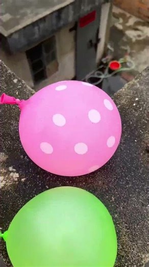 experiment will a water balloon explode if it rolls down from a tall building