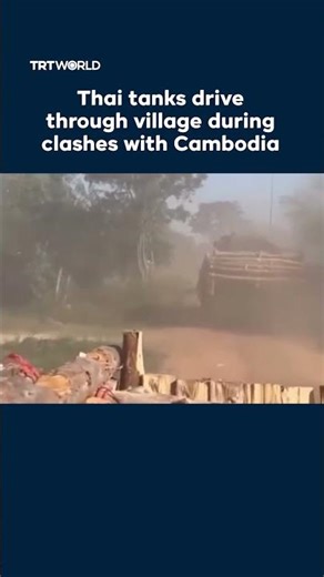 Thai tanks drive through village during clashes with Cambodia