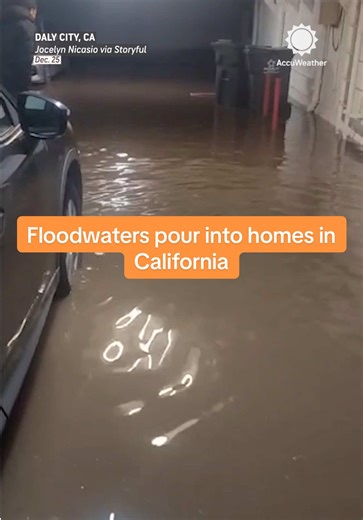 A powerful storm moved through California on Christmas Day, bringing flooding rain and damaging winds to the Bay Area. Video shows floodwaters pouring into homes and streets in Daly City.