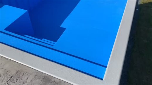 Beautiful 12’x40’ Trek Container Pool perfectly set in the hillside as a retaining wall for this lovely Midwest farmhouse. Save time and money by installing a Trek Container Pool and skip the expensive retaining wall. DM us today to find out more! | Trek Pools