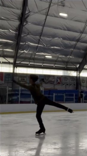 Figure skating and doing my double loop jump.