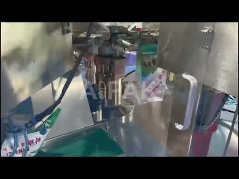 How Does a Rotary Packing Machine Fill Milk Powder into Pouches with Screw and Vacuum Feeding?