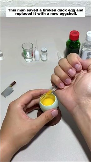 This man saved a broken duck egg and replaced it with a new eggshell.