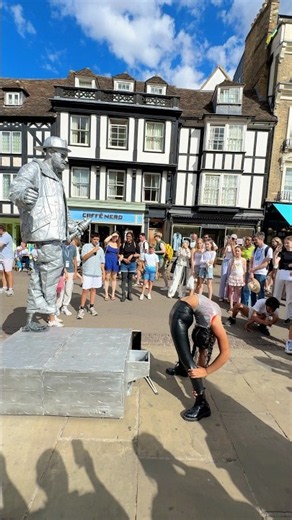 When The WORLDS Most FLEXIBLE Person High Fives The LEVITATING Statue!
