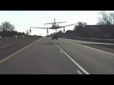 Dramatic video shows plane making emergency landing on highway