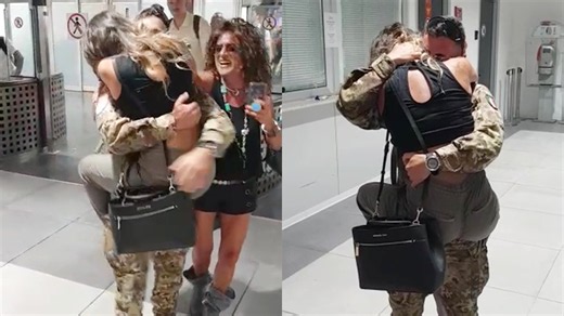 Wife leaps into the arms of her military spouse at the airport upon his return from duty