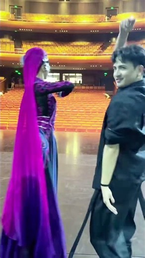 Feel the Rhythm! A Lively Uyghur Dance Duo from Xinjiang.