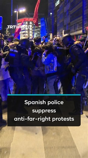 Spanish police use batons, rubber bullets to disperse counter-protesters after right-wing Vox rally