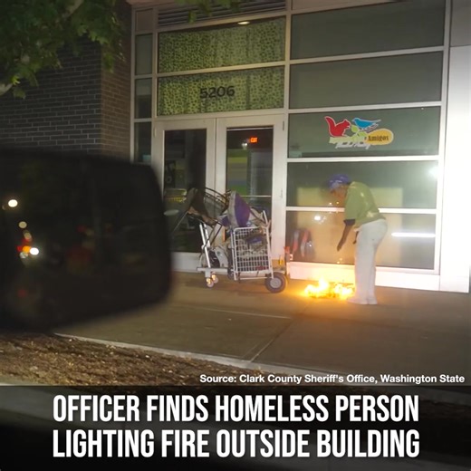 The Clark County Sheriff's Office out of Washington State released footage showing an officer discovering a homeless person lighting a fire right outside of a building. Fortunately after the officer checked in on the person, the fire went out. | Breitbart