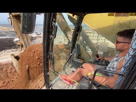 Inside the Cab of the CAT 385C at the Mine