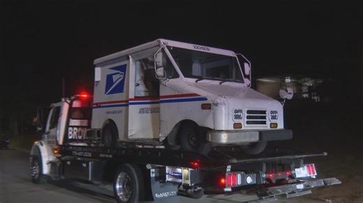 USPS trucks flips during crash in Decatur neighborhood, woman pinned underneath truck
