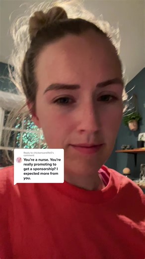 Old Age Nurse Demonstrates How to Properly Use a Thermometer