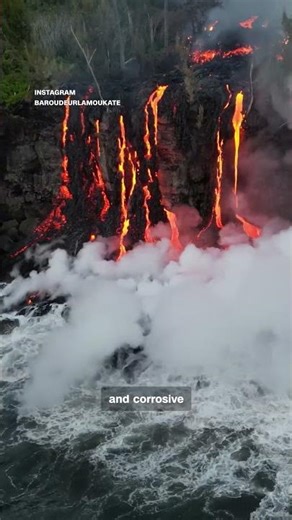 Volcano eruption creates 'lava haze' as it reaches ocean