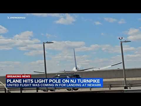 Plane landing at Newark Airport hits light pole on NJ Turnpike