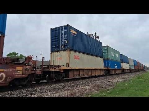 BNSF 3962 leads a extremely fast Stack train through Mazon, IL