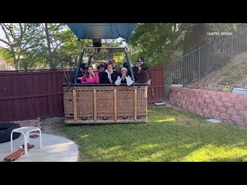 Hot-air balloon makes emergency landing in suburban backyard