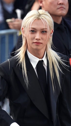 House ambassador Felix of Stray Kids arriving at the Louis Vuitton Spring/Summer 2027 show.