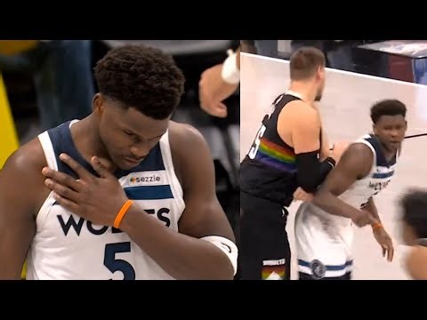 Anthony Edwards hurts shoulder after fall then again on a Nikola Jokic screen