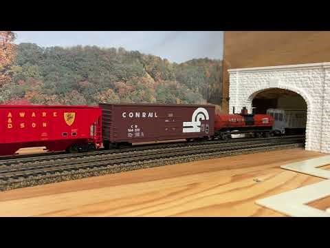Long Conrail Freight With Lots Of Power At The Tunnel