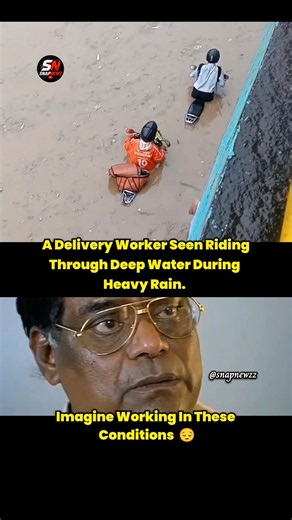 Delivery Continues Despite Heavy Rain😢 #deliveryboy #snapnewzz #riding #water #rainyday #instamart
