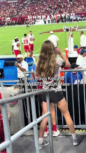 Travis Kelce gives game-used gloves to fans at preseason game