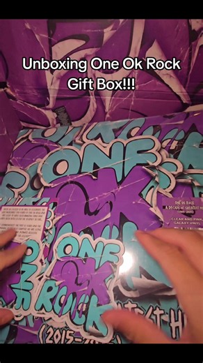 Received this gift box from One Ok Rock, one of my favorite Japanese Rock bands!! I'm so happy that it came with items like their upcoming One Ok Rock - A Decade of Greatest Hits 2015-2025 vinyl record (Clear and Pink Galaxy Vinyl variant), Greatest Hits Catalogue Art Tee, OOR stickers, and an invitation to their upcoming Los Angeles special acoustic show at Amoeba Music - Hollywood! Genuinely so grateful for these gifts and invitation. Cannot wait to attend their show next week! @ONE OK ROCK ON