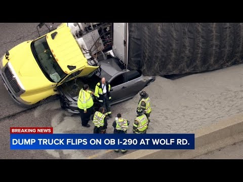 Dump truck rolls onto car on Eisenhower Expressway in west suburbs, video shows