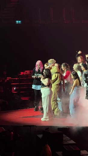 Girl falling off stage at MGK concert