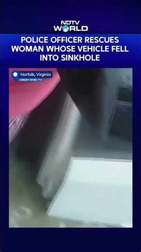 US News | Virginia Officer Rescues Woman After Car Falls Into Water-Filled Sinkhole