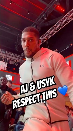 ANTHONY JOSHUA & OLEKSANDR USYK SHOWING GIVING TIME TO A YOUNG MAN