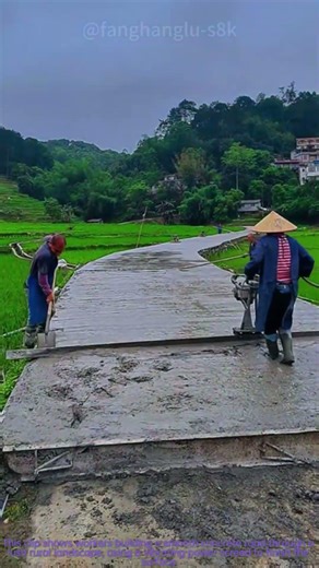 Village concrete road construction with a power screed