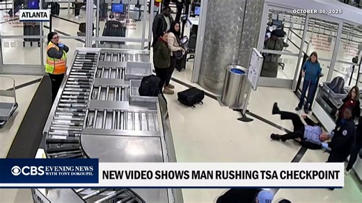 Newly released video shows a man entering the main checkpoint at Hartsfield-Jackson Atlanta International Airport at full speed, pushing through passengers and TSA agents in an apparent attempt to breach security. https://cbsn.ws/4aoWrOb | CBS News