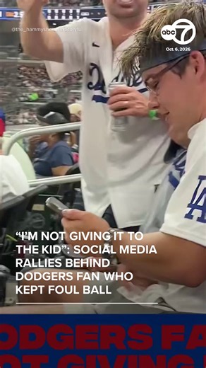 KEEP IT OR GIVE IT TO THE KID? ⚾ A viral ballpark standoff is dividing baseball fans after a #Dodgers fan caught a foul ball in #Atlanta and refused to give it to a young #Braves fan sitting nearby. Critics are calling it poor etiquette, while others say he had every right to keep it.