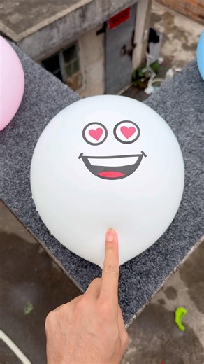 Experiment: Will a water balloon explode if it rolls down a tall building? 💥🎈 #balloon